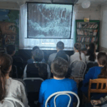 Документальные киноленты смотрят читатели Новокрасненской библиотеки